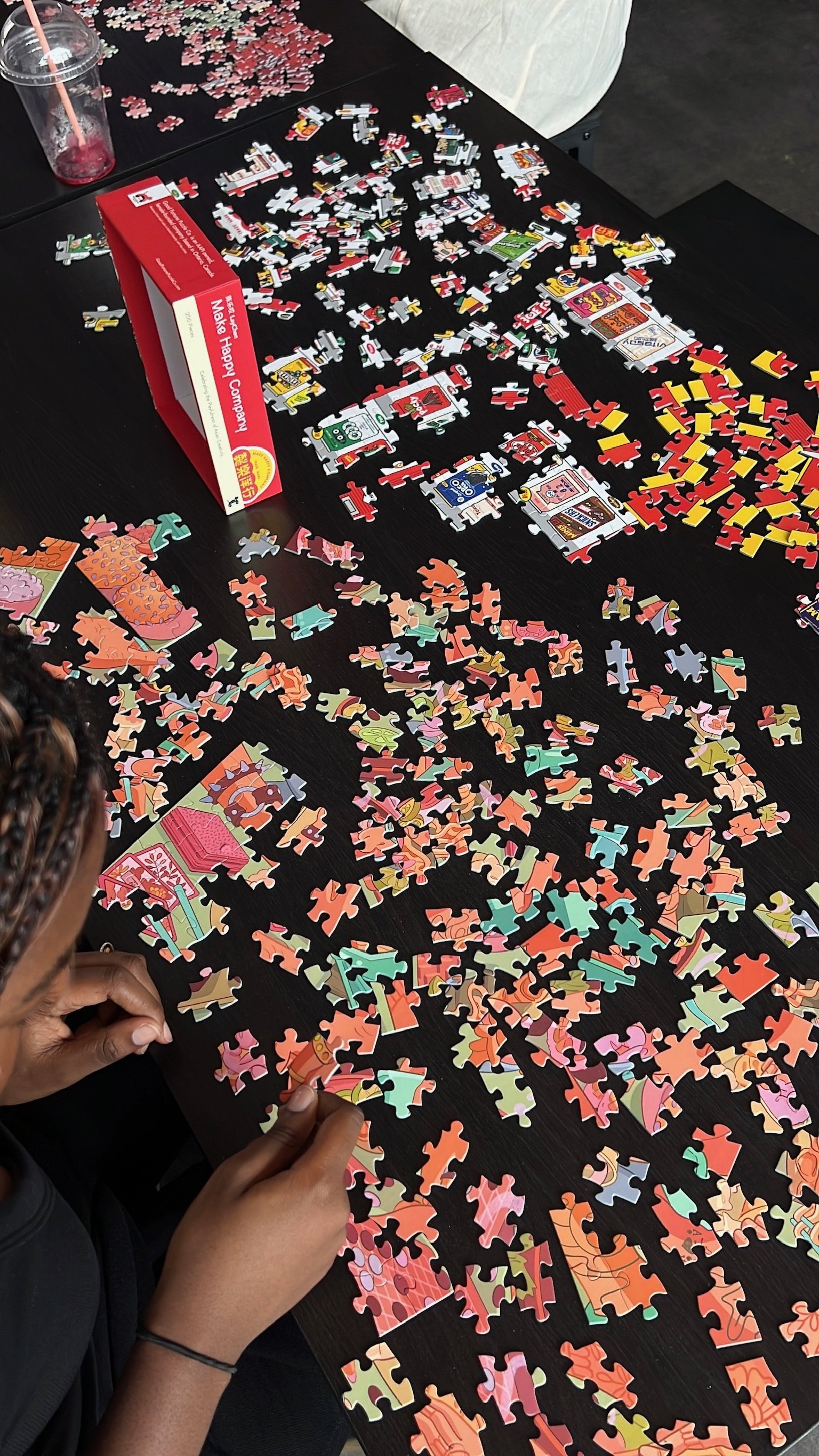 Close-up of a nearly finished snack-themed puzzle
